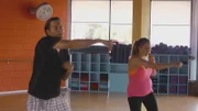 Lizzie and Sam at a yoga studio.