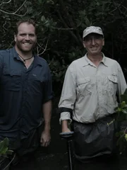 Josh and treasure hunter Gary Drayton look for Spanish treasure in a Florida swamp.