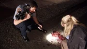 Polizisten bei der Spurensicherung