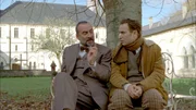 L-R: Jean Larosière, Kommissar (Antoine Duléry), Émile Lampion, Inspektor (Marius Colucci).