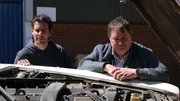 Mike and Elvis posing. Open front bonnet of car.