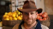 Josh Gates in a market in Jerusalem, Israel.