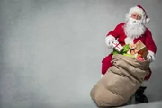Santa Claus with a bag full of presents