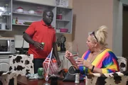 Angela and Michael have an intense talk in their apartment in Nigeria