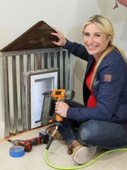 Heather and Kevin have two dogs they adore, so Jasmine is doing a DIY dog door decoration everyone can appreciate.