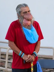 Roger waits outside the clinic.