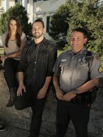 Sgt. Mike King, Bill Hartley, Elizabeth Saint, Nick Groff, Dana Mitchell, and Lorie Johnson in front of the clock tower.
