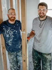 Keith Bynum (L)  and Evan Thomas (R) pose during renovation, as seen on HGTV's Bargain Block.