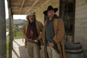 Stan Smith (l.); Josh Gates (r.)