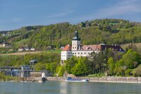 Castle Persenbeug at the Danube in Austria. In the background is the danube power plant Ybbs/Persenbeug.