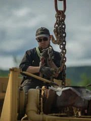 Kevin attaching chains to pump.