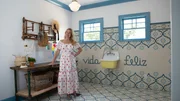 Designer Grace Mitchell, of HGTV's One of a Kind, in the mud room that she designed for the McGuire family.