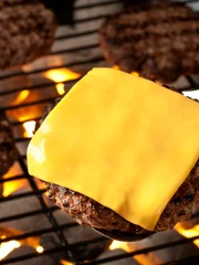 Grilled burgers on the grill.  Please see my portfolio for other food related images.