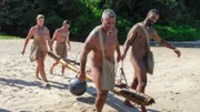 L-R: Angela, Russell, Charlie and Max carry raft.