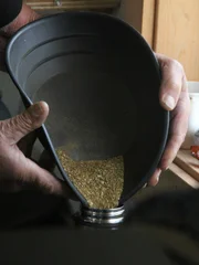 Close up of doumitt pouring gold.