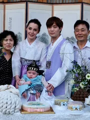 Deavan, Jihoon, and their family celebrate their baby’s 100th Day.