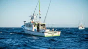 Pinwheel boat next to Hot Tuna boat. (PFTV/Thomas Brankin)