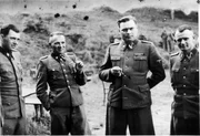 SS IN SOLAHUETTE (AUSCHWITZ)
