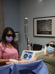 Dr. Lee uses a laser on Kaitlin Rose’s arms to rid of them of the marks from years of illicit IV drug use.