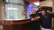 The Guys and Anthony hang out by the tank.