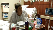 Angel eating on her hospital bed.