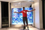 Hassan in front of his new tank.