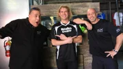 Wayde, Brett and Paul pose in front of the scorpion tank.