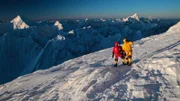 Mountaineers on a snowy mountain.