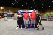 Wayde and Brett pose with Snap On reps in front of the tank.