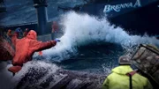A few waves never scare the crew of Brenna A away from their duties.