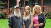 Victoria with her parents.