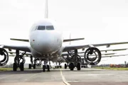 Close up of Plane landing on runway at eCube Solutions