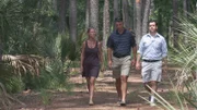 Realtor, Chris Haro (R) walking with the homebuyers, Andy (C) and Sheila Smith (L) at the third home.