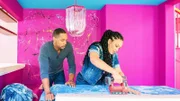 Egypt Sherrod and Mike Jackson work on their 90s dining room, as seen on Barbie Dreamhouse Challenge, Season 1.