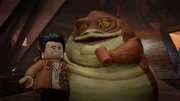 (L-R): Poe Dameron and Graballa the Hutt in LEGO STAR WARS HALLOWEEN SPECIAL exclusively on Disney+. ©2021 Lucasfilm Ltd. & TM. All Rights Reserved.