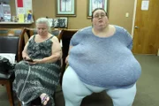 Jeanne and Barbara sit in clinic waiting room