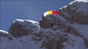 Combination of skiing and base-jumping.