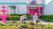 Keith Bynum and Evan Thomas plant flowers in the front yard, as seen on Barbie Dream House Challenge, Season 1.