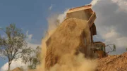 Sand spilling with the help of a truck.