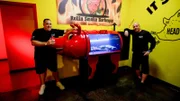 L-R: Wayde King and Brett Raymer stand with the finished BBQ smoker tank.