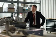 REENACTMENT - In a metallurgical testing lab, the lead investigator (played by Jeff Kassel) examines a piece of landing gear from the wreckage of Martinair Flight 495. (Cineflix 2021/Darren Goldstein)