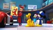 On the right: Donald Duck, Mickey Mouse, Pluto
