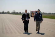 REENACTMENT - The lead investigator (played by Jeff Kassel) and an NTSB investigator (played by Dan Mackay) look for the point of impact of Martinair Flight 495. (Cineflix 2021/Darren Goldstein)