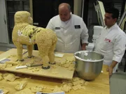 Pizza Cake and James the Dog Cake. Mauro Castano and Buddy Valastro work on the James the Dog cake.