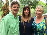 Portrait shot of contributors Mardy (right) and Dave Murray (left) and agent Amber Williams (middle) in Playas Del Coco, Costa Rica, as seen on Mardy and Dave's house tour on House Hunters International (portrait)