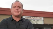 Rock-A-Billies owner Jimmy Nigg poses outside his restaurant in Denver, Colorado, as seen on Food Network's Mystery Diners, Season 7.