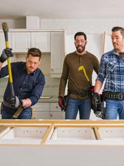 Drew, Jonathan and Michael begin the demolition process