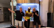 Experts are in New Jersey to fix Wyclef Jean's aquarium problem.