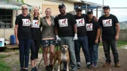 Bonnie, Tara, and Amanda pose for a picture with the volunteers who work at Second Chance Animal Rescue.