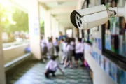 Outdoor CCTV monitoring at a school corridor, security cameras.